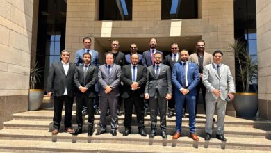 الاستاذ حسام عبدالغني مع وزير الاسكان وباقي المطورين العقارين